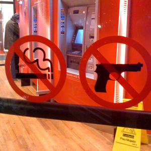 No smoking guns. (Also, guy with face mask?)