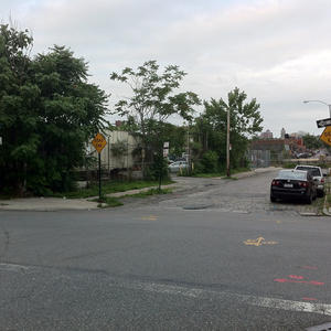 Conflicting "One Way" signs on a scenic Brooklyn waterfront.