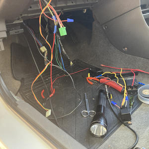 Who put an aftermarket anti-theft system in a car that cost $8,000 new, then TOOK IT HALFWAY OUT before selling it?