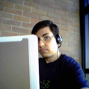 Hiding behind a laptop...