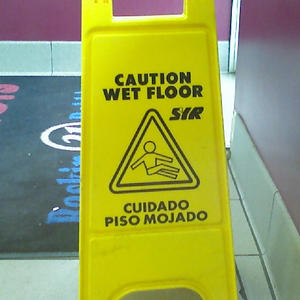 That means "wet floor?" Really? Looks to me like he's relaxing.